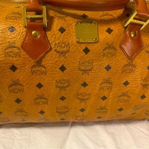 Authentic vintage mcm Boston Traveling bag with normal wear and tear with age